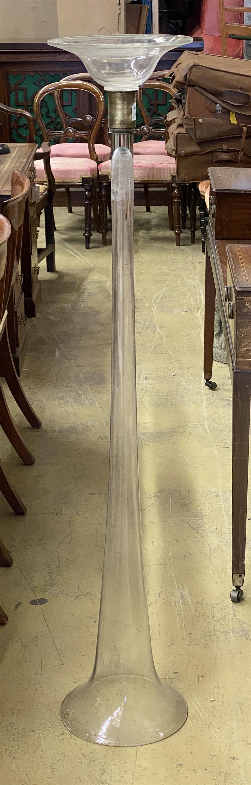 A tall fluted glass vase, height 142cm, width 27cm